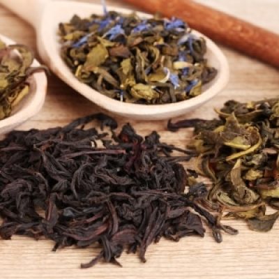 Tea leaves on spoon
