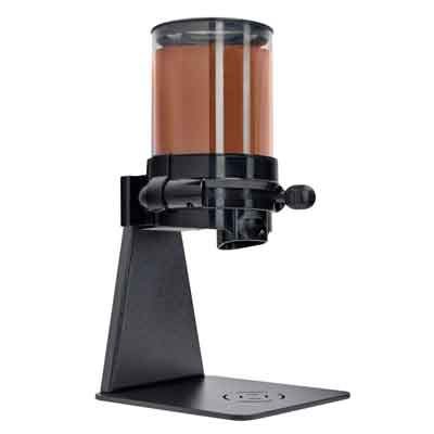 Ground spices dispenser on black stand